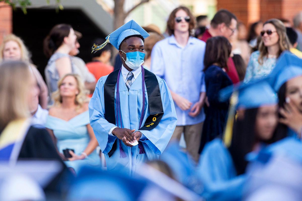 Graduates enter during a commencement ceremony for the El Capitan High School class of 2022 on the El Capitan High School campus in Merced, Calif., on Thursday, June 2, 2022.