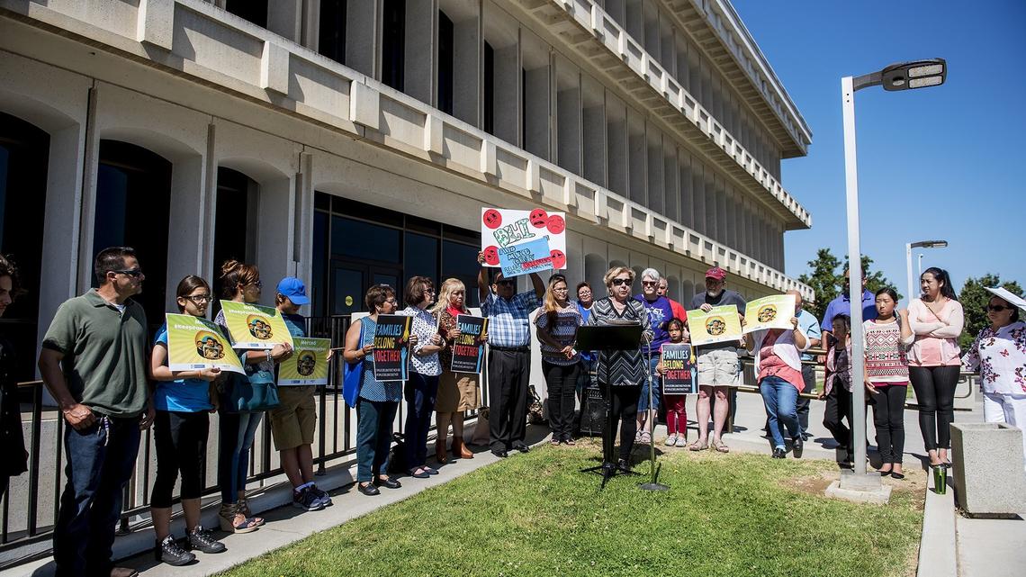 Area residents hold a rally calling for an end to the separation of immigrant children and parents who are detained by the U.S. Immigration and Customs Enforcement agency, outside the Merced County Administration Building located at 2222 M Street in Merced, Calif., on Friday, June 29, 2018.