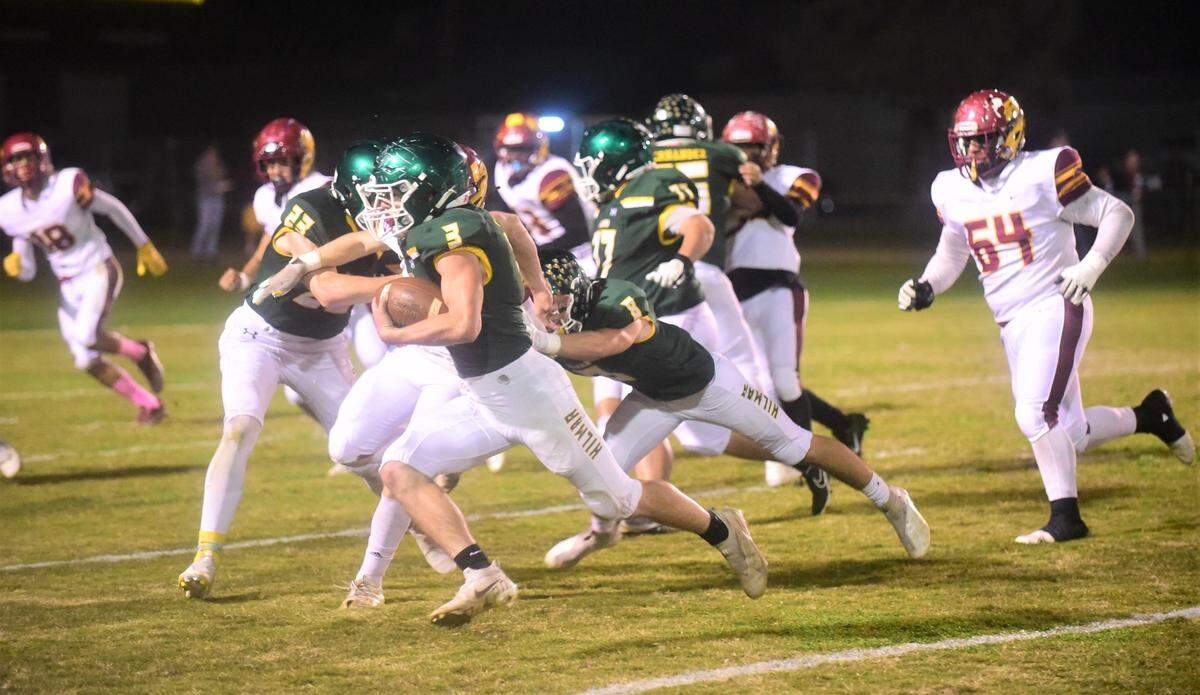 Hilmar High senior Broc Perry returns an interception for a touchdown during a playoff game against Los Banos on Friday, Nov. 5, 2021 at Hilmar High School.