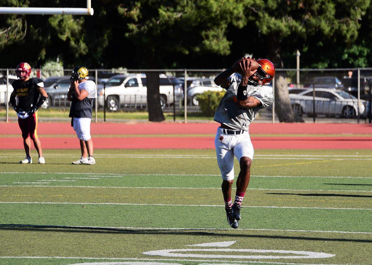 Former Merced High receiver Xavier Stewart catches a pass during an all-star practice at Atwater High on Tuesday, June 18, 2019.