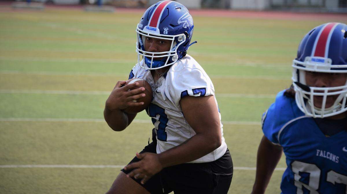 Atwater senior running back James Thomas runs the ball during practice on Thursday, Aug. 19, 2021.