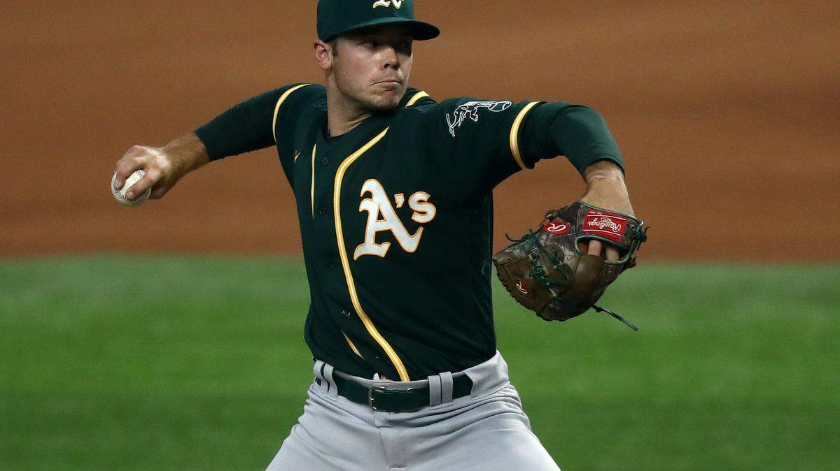 ARLINGTON, TEXAS - SEPTEMBER 12: Daulton Jefferies #66 of the Oakland Athletics throws in his major league debut against the Texas Rangers in the first inning at Globe Life Field on September 12, 2020 in Arlington, Texas. (Photo by Ronald Martinez/Getty Images)