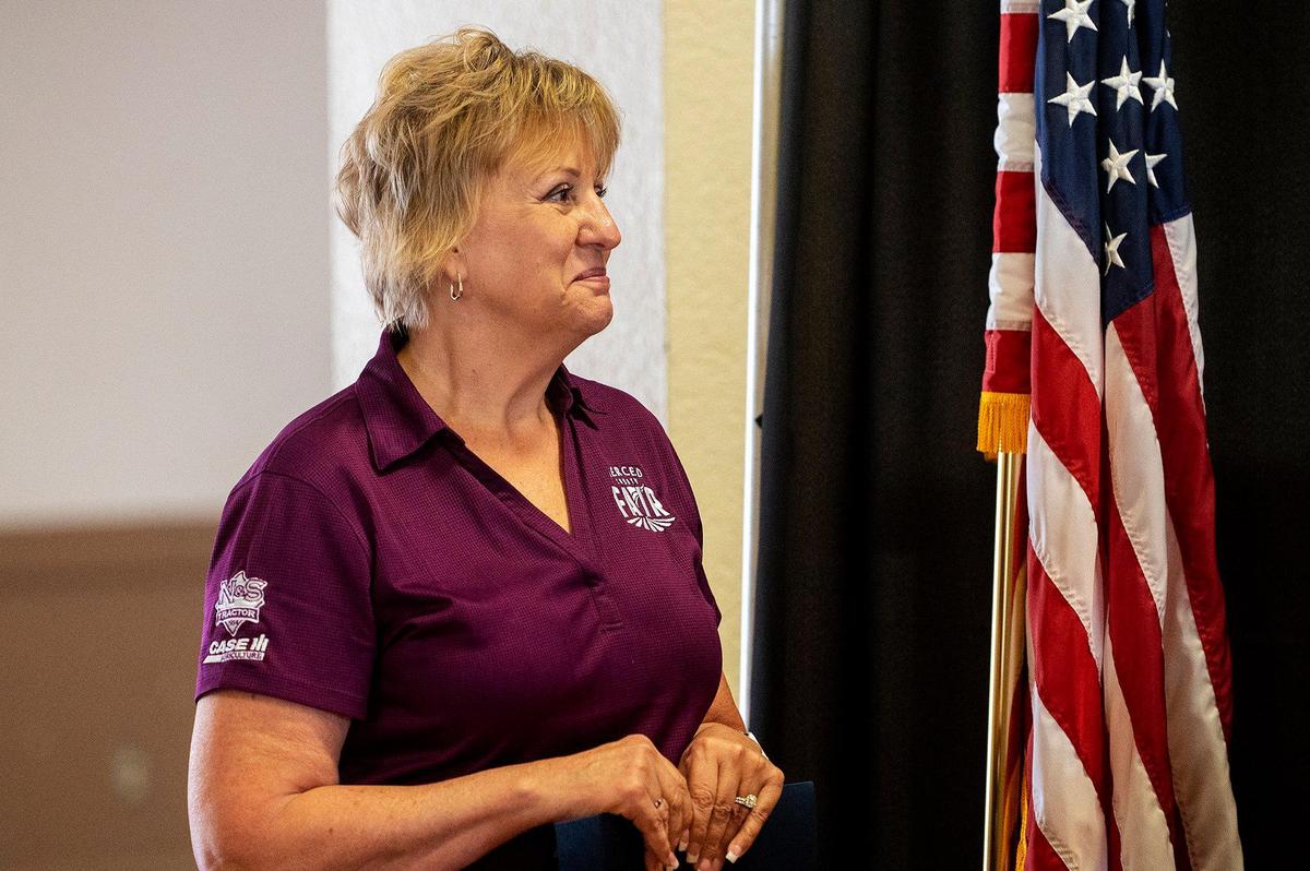 Merced County Fair CEO Teresa Burrola looks on during a news conference announcing $5 million in state funding awarded to the Merced County Fair at the Merced County Fairgrounds in Merced, Calif., on Wednesday, Aug. 9, 2023. According to Merced County Fair President Vicky Banaga, the funding will be used to upgrade facility kitchens, facility HVAC and a new roof for one of the buildings.