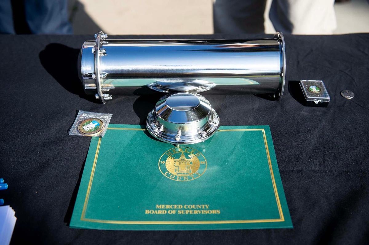 A time capsule is displayed during a ceremony to celebrate the start of a project to restore the exterior of the historic Merced County Courthouse Museum in Merced, Calif., on Wednesday, Dec. 11, 2024. More than $3 million in funding was secured for the restoration process which will help to maintain the building’s structural integrity and long-term sustainability. County officials said the time capsule containing various items will be buried on the property upon completion of the restoration project.