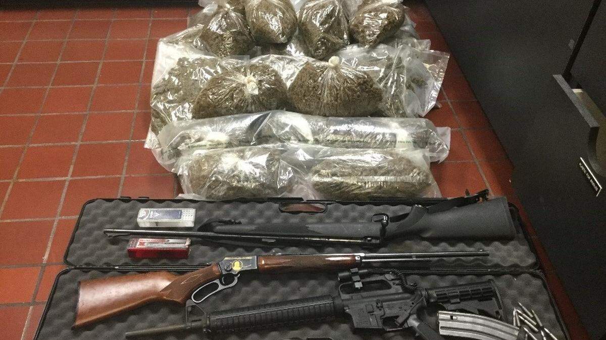 A Merced man and woman were arrested on Tuesday, Oct. 2, 2018, with three firearms and 24 pounds of marijuana, police said.