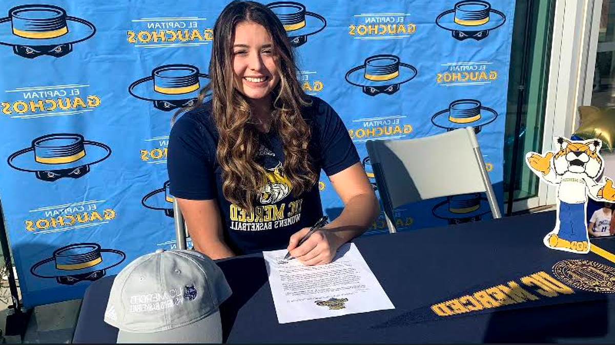 El Capitan senior Courtney Behn signed her national letter of intent to play basketball at UC Merced on Friday at El Capitan HIgh School.