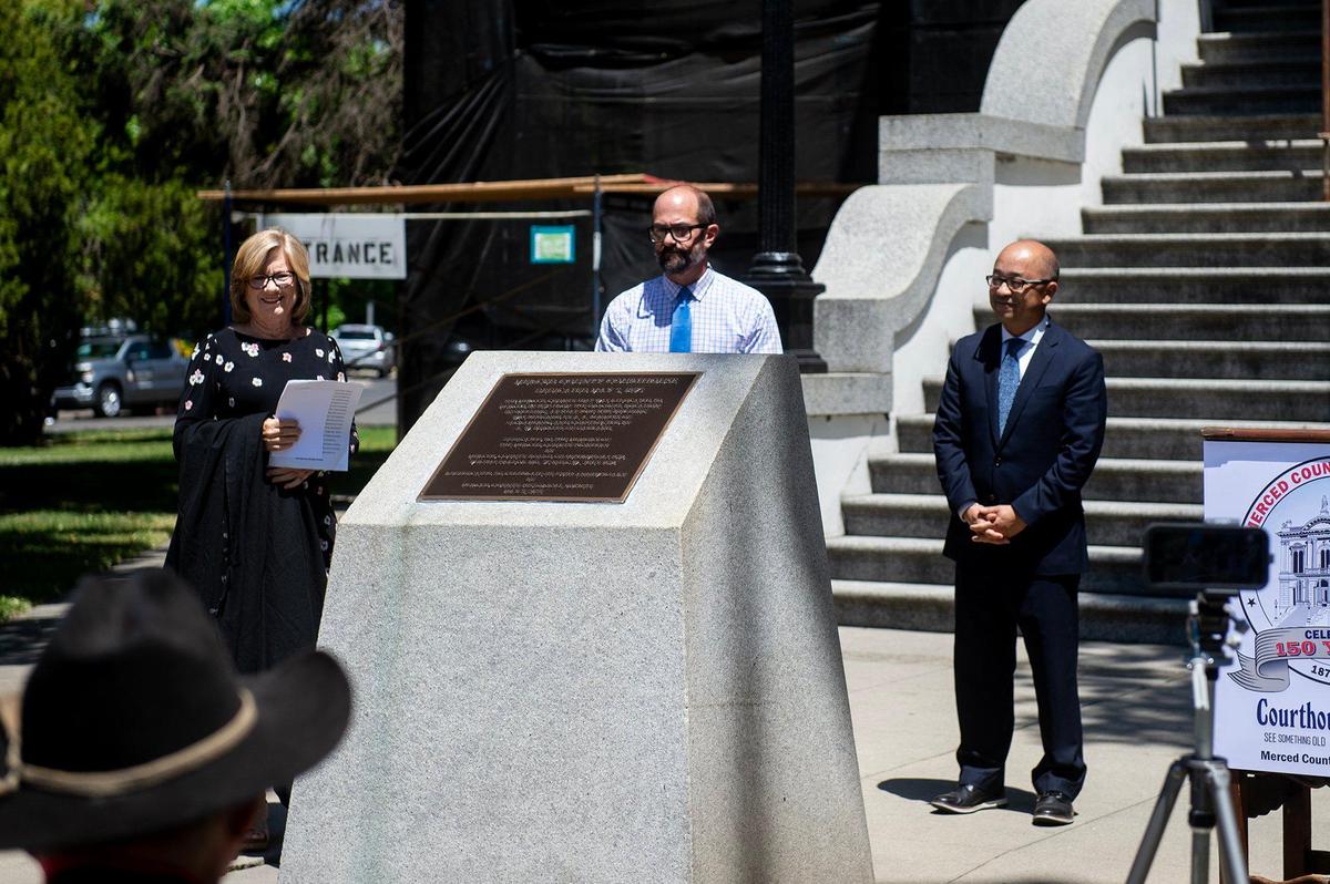 A newly installed plaque is unveiled during a rededication ceremony for the historic Merced County Courthouse in Merced, Calif., on Monday, May 5, 2025. The ceremony was held 150 years to the day from when the courthouse was originally dedicated in 1875.