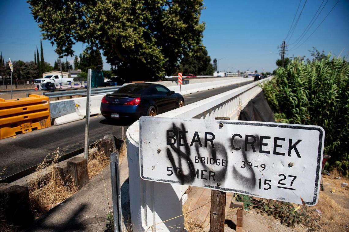 Motorists navigate a lane closure on the Bear Creek Bridge near the intersection of West 16th Street and Highway 59 in Merced, Calif., on Friday, July 18, 2025. A lane of the bridge has been closed in each direction as crews work to complete a California Department of Transportation seismic retrofit project in Merced County.