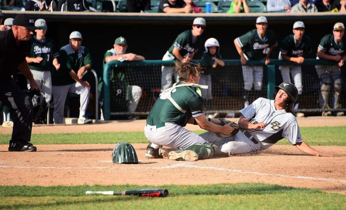 Buhach Colony sophomore Brandon Veenstra is thrown out at the plate by Ponderosa during the Sac-Joaquin Section Division III championship game on Monday, May 27, 2019.
