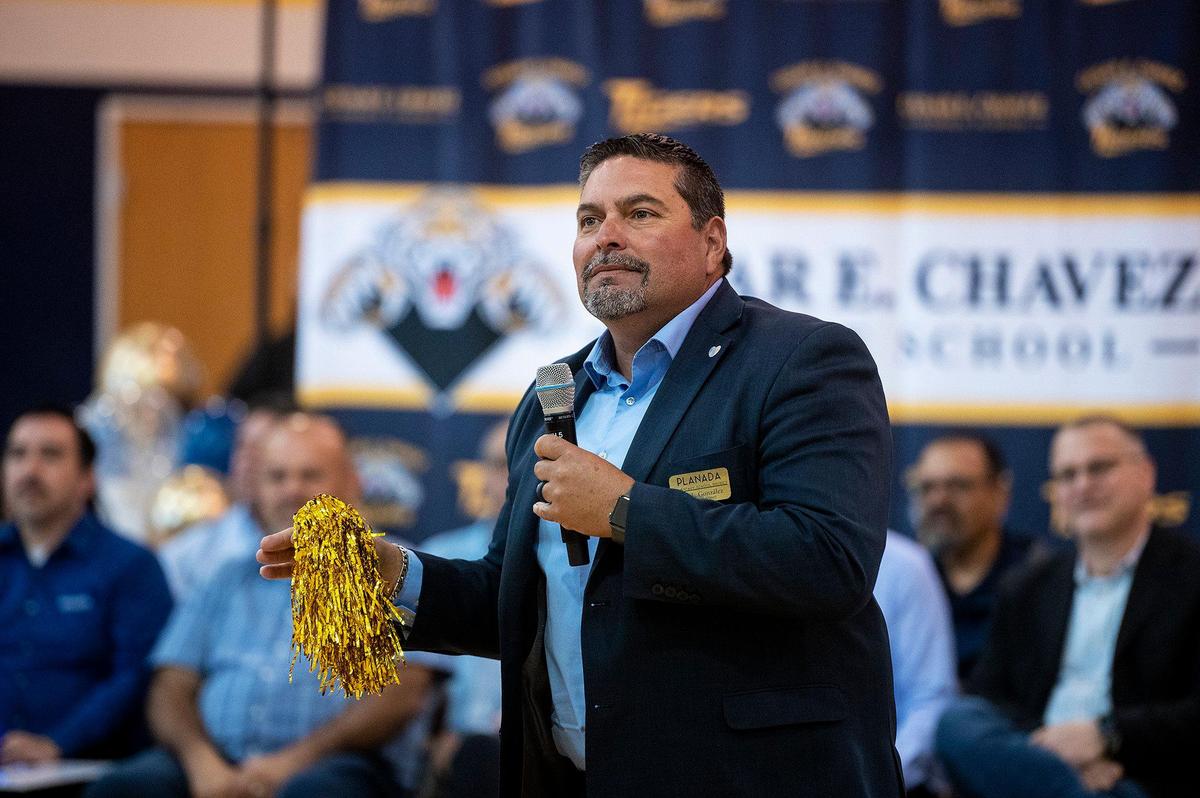Planada Elementary School District Superintendent Jose Gonzalez, speaks to eighth-graders during a ceremony announcing a $4.5 million investment by Comcast to bring high-speed internet and broadband services to the area, at Cesar E. Chavez Middle School in Planada, Calif., on Monday, April 17, 2023. According to Nathan Ahle, Comcast Director of Government Affairs for the South Valley, the $4.5 million investment involves extending the existing network from nearby Merced into the town of Planada.