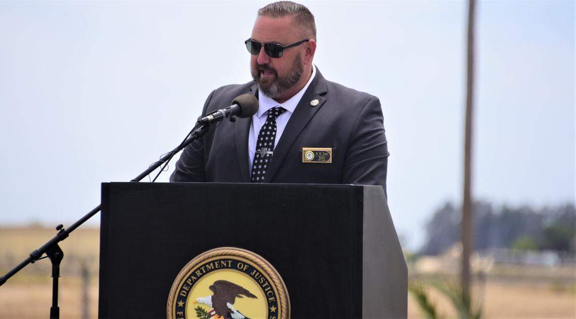 United States Penitentiary-Atwater Warden Bradley M. Trate speaks during the ceremony to unveil a memorial statue in honor of Jose V. Rivera on Friday, June 17, 2022 in Atwater, Calif.