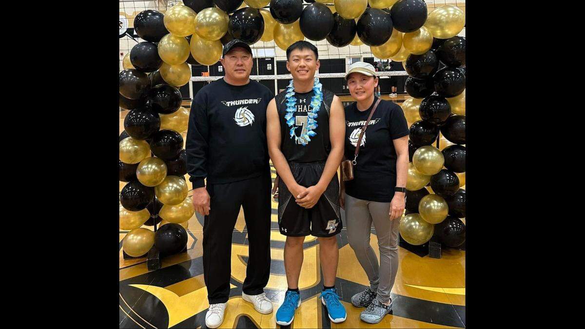 Buhach Colony High senior Felix Chang was named the CCC Most Valuable Player after leading the Thunder to a CCC championship. Chang is pictured with his parents Eileen Xiong and Toua Chang on senior night.
