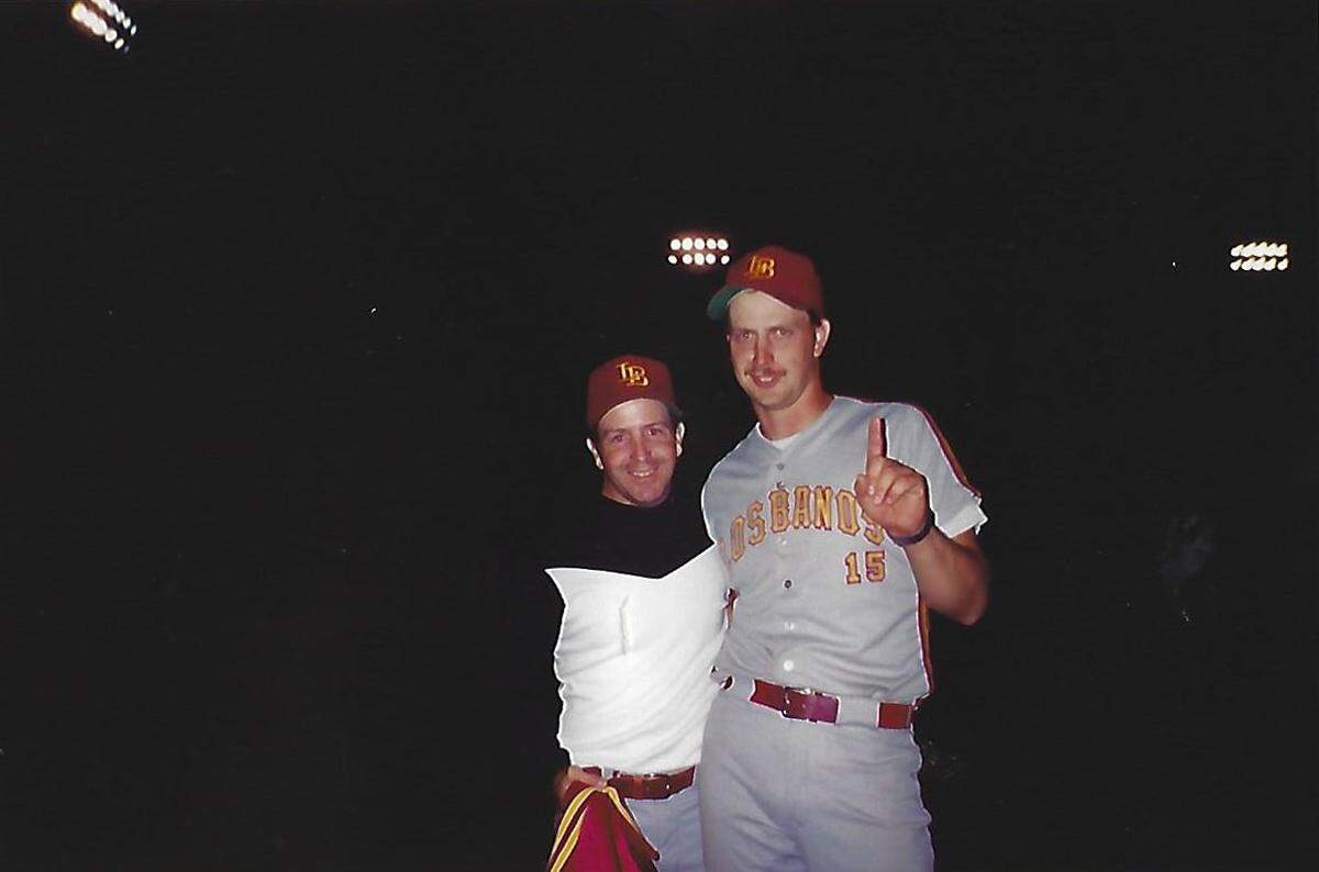 Former Los Banos High baseball coaches Keith Petiti (left) and Greg Wakefield celebrate winning the Sac-Joaquin Section Division II championship in 1994.