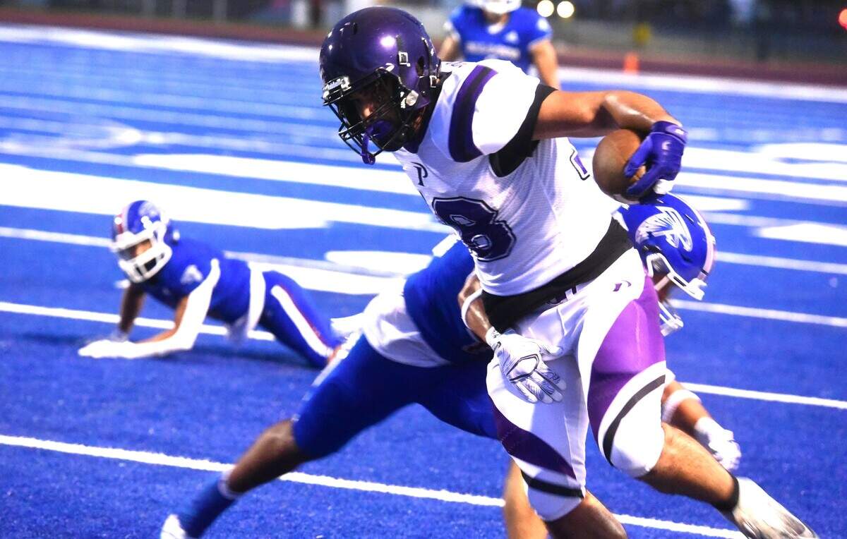 Pacheco High tight end Peyton Mosley tries to break a tackle after making a catch during a game against Atwater on Friday, Aug. 23, 2024 at Dave Honey Stadium in Atwater, Calif.