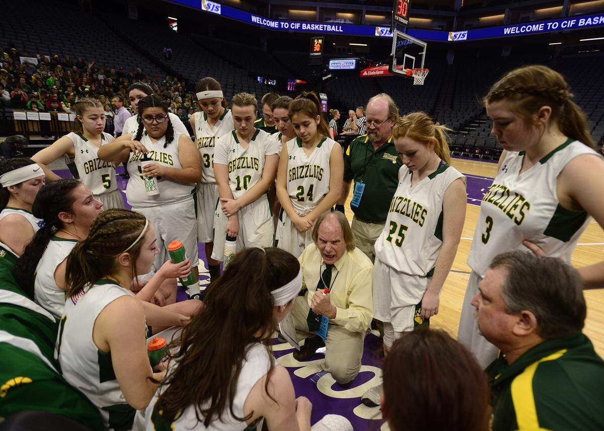 Grizzly head coach Trace DeSandres talks to his team during a timeout, during the Mariposa High vs Argonaut Sac-Joaquin Section Division V Championship at Golden 1 Center in Sacramento, on February 23, 2019. Despite a fourth quarter effort to comeback, the Mariposa Grizzlies lost to Argonaut.