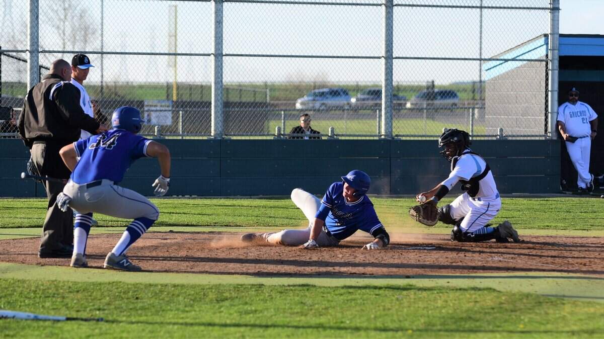 Atwater senior Jacob Weiss slides home safely to score a run during the Falcons’ 14-3 win over El Capitan on Tuesday, March 10, 2020 at El Capitan High School.