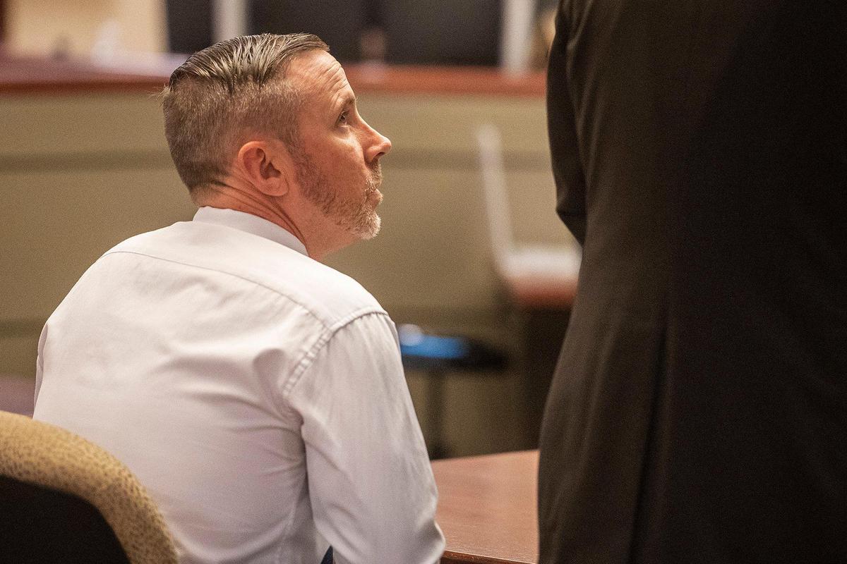 Former Merced County Sheriff Sgt. Dustin Witt, 42, looks to attorney Roger D. Wilson as Witt is arraigned on charges of assault by a public officer, assault likely to cause bodily injury and an enhancement for inflicting great bodily injury, in Merced County Superior Court in Merced, Calif., on Wednesday, Aug. 16, 2023. According to authorities, Witt is accused of kicking a detained man in the head several times when he responded to a March 11, 2023 DUI-related vehicle crash.