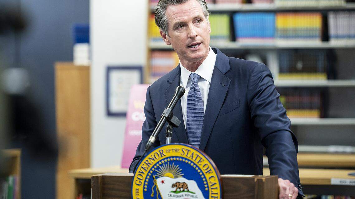 Governor Gavin Newsom announces the confirmation of California’s first case of the omicron variant of COVID-19 during a visit to a vaccination clinic at Frank Sparkes Elementary School in Winton, Calif., on Wednesday, Dec. 1, 2021.