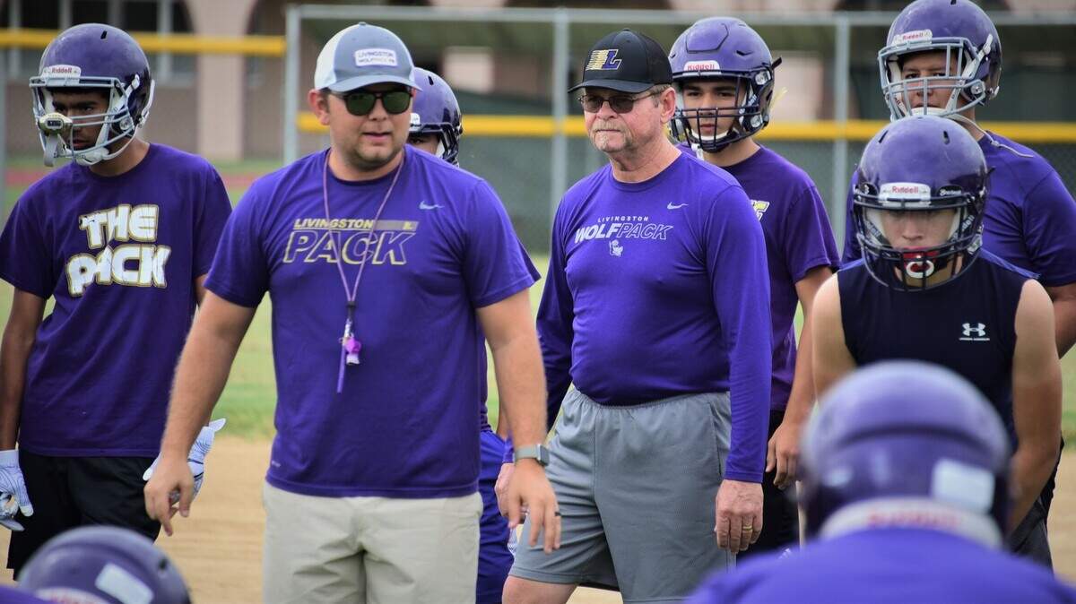 Joining the Livingston High School football coaching staff this season has given Scott Wine (center) the opportunity to coach with his two sons Steven (left) and Brian (not pictured).