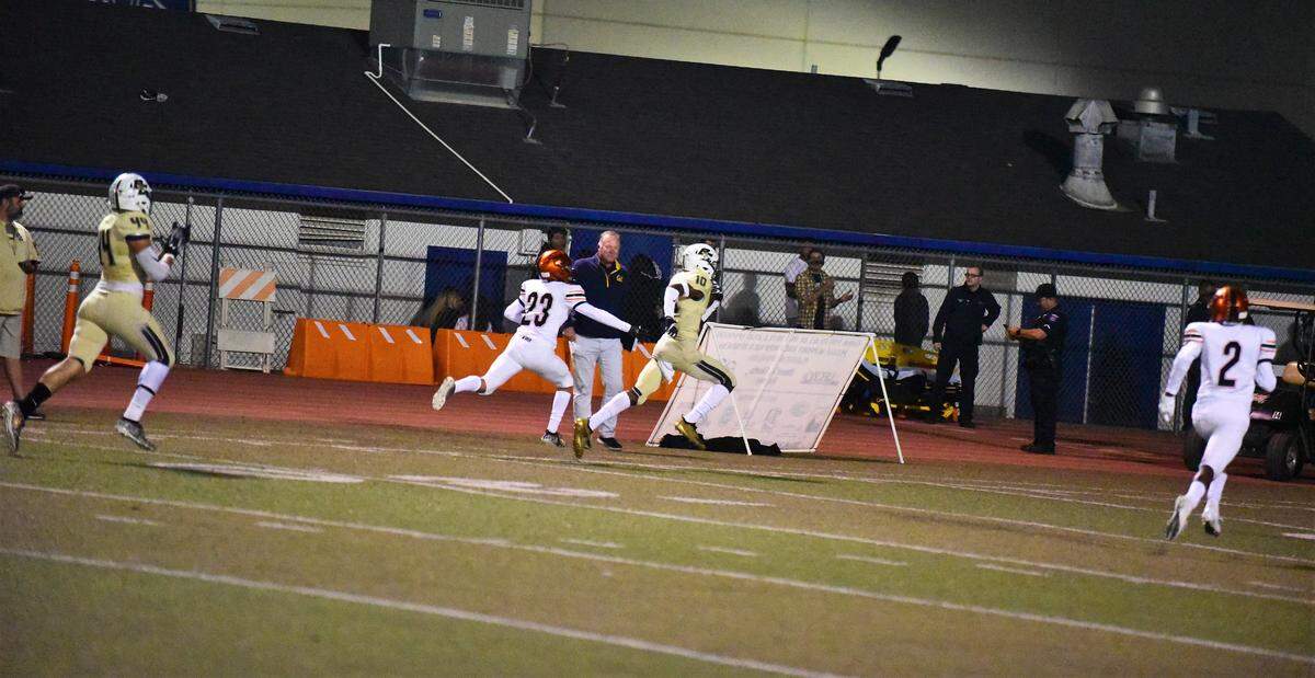 Buhach Colony receiver Jalon Jackson runs away from the Merced defense for a 65-yard touchdown reception during a game on Friday, Oct. 11, 2019.
