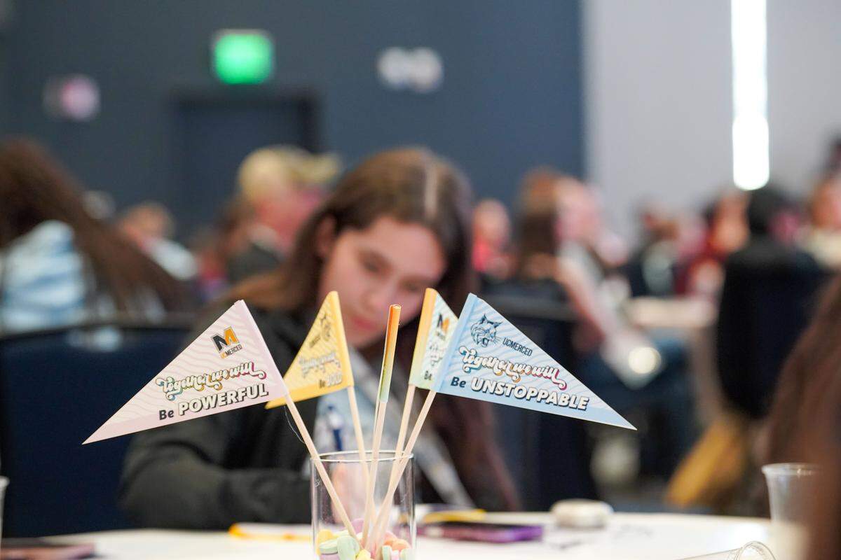 An attendee of the “Together We Will” conference at UC Merced takes notes on Sunday, March 8, 2026.