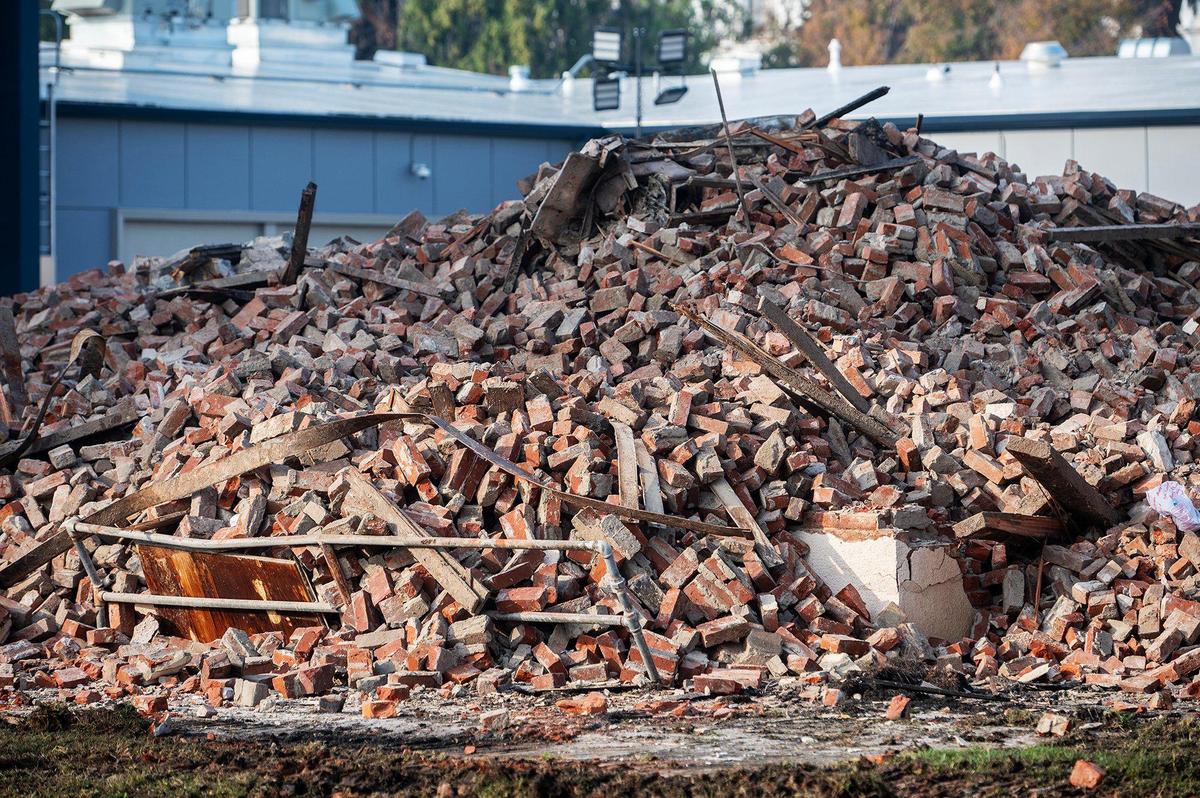 A historic 19th century building and the first Merced County building constructed as a high school, is now a pile of rubble, located at 2125 M Street in Merced, Calif., on Thursday, Dec. 5, 2024. Both city and county firefighters responded to the blaze which broke out inside the structure Monday morning.
