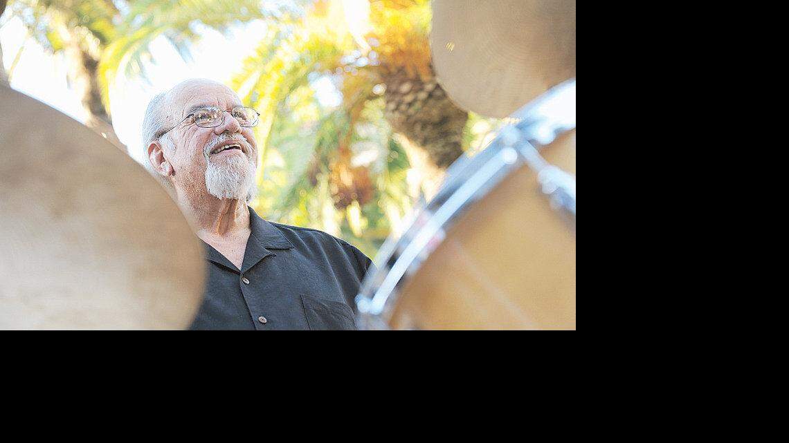 SUN-STAR PHOTO BY BEA AHBECK
From behind his drum kit, Rudy Merino listens to a speech in his honor during a celebration dinner for him at Fernando's in Merced on June 17.
