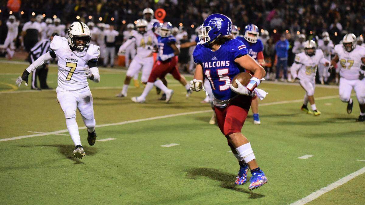 Atwater High tight end Xavier Wilson, shown here against Buhach Colony, caught two touchdowns to help the Falcons open the playoffs with a 50-26 win over Kimball.