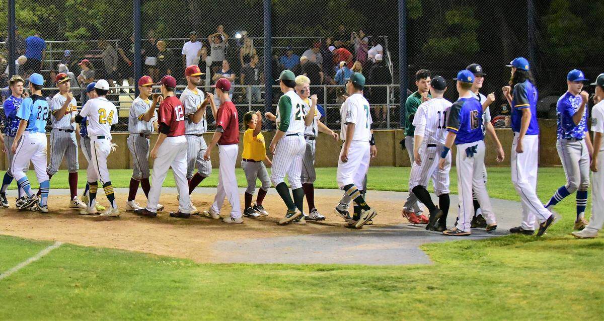 The North and South all-star teams shake hands after finishing in a 5-5 tie in the 10th annual Merced County All-Star Game on Saturday, June 8, 2019 at Merced College.