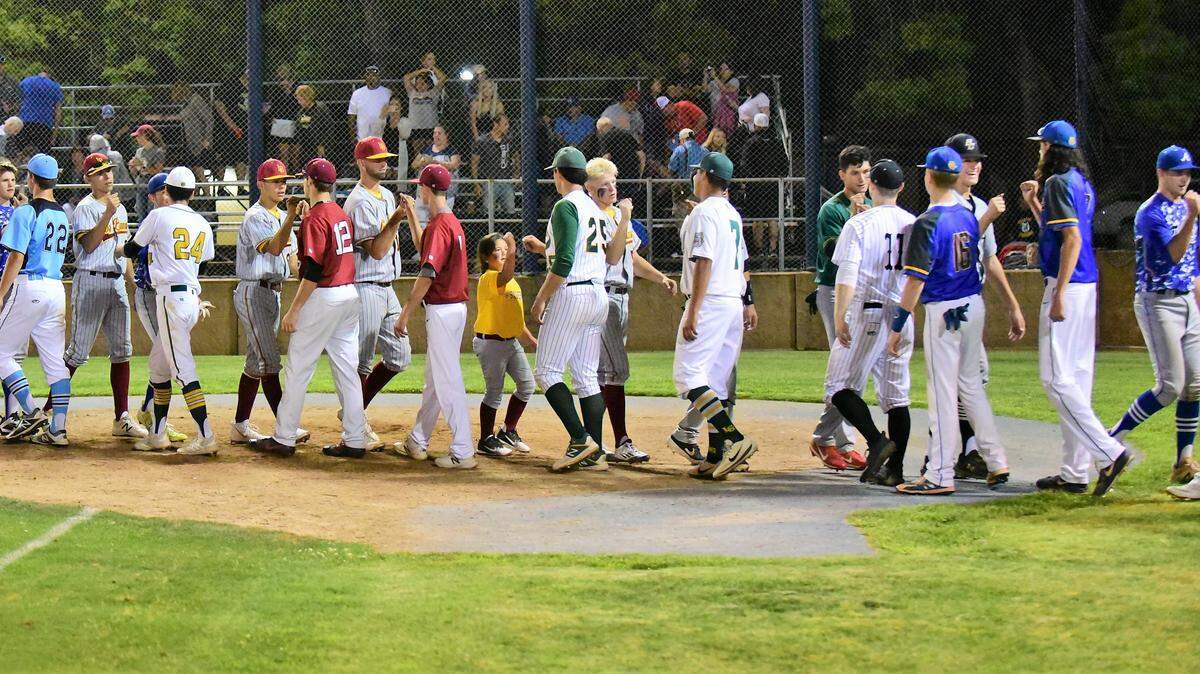 The North and South all-star teams shake hands after finishing in a 5-5 tie in the 10th annual Merced County All-Star Game on Saturday, June 8, 2019 at Merced College.
