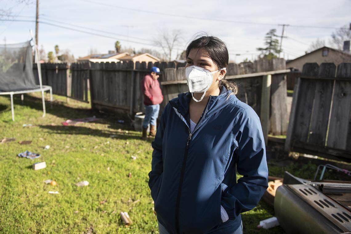 Isabel Ramirez, 24, speaks about having to evacuate from her home due to flooding in Planada, Calif., on Thursday, Jan. 12, 2023. Ramirez recently returned to her home after the Merced County Sheriff’s Office downgraded an evacuation order to a warning.