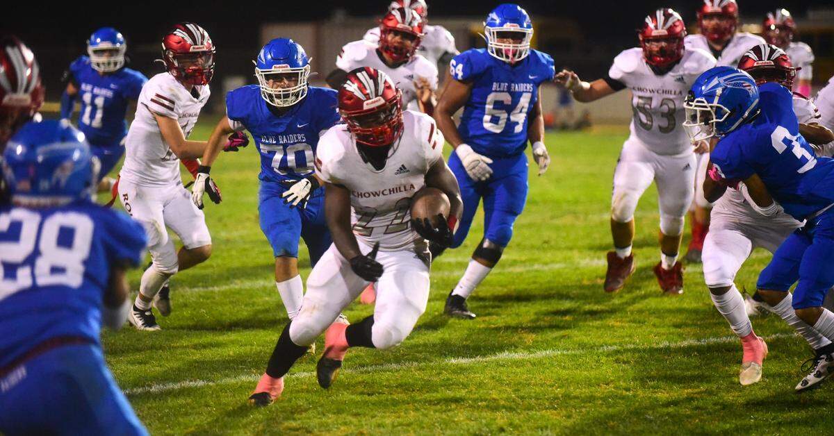 Chowchilla High School junior running back Dwayne Hemphill (22) runs the ball against Caruthers during a game on Friday, Oct. 20, 2023.