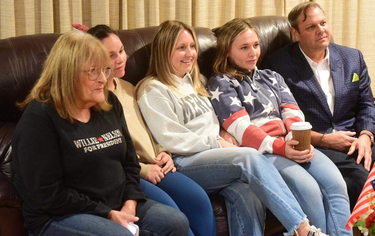 Merced City Councilmember Sarah Boyle, center, watches election results with supporters (from left to right) Susan Alcorn, Kinsey Haas, Kayleigh Haas and Marc Garcia on Tuesday, Nov. 5, 2024 in Merced, Calif.