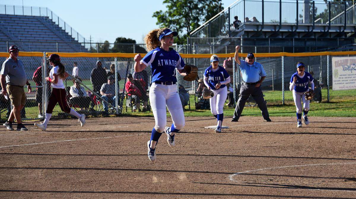 Atwater High senior pitcher Megan Escobar celebrates the final out of the Falcons’ 6-1 victory over Golden Valley on Wednesday, April 10, 2019 at Golden Valley High in Merced, Calif.