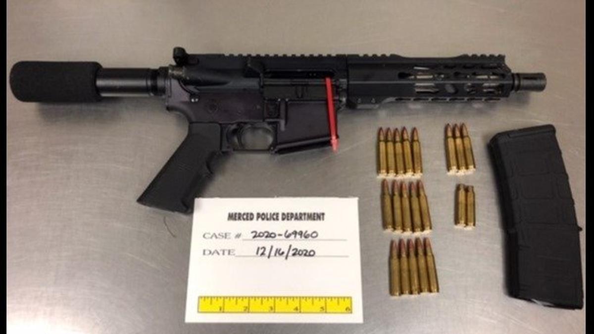 An assault weapon thrown from a vehicle during a pursuit was recovered by police on Wednesday, according to the Merced Police Department. Police said two suspected gang members were arrested. Image courtesy of Merced Police Department.