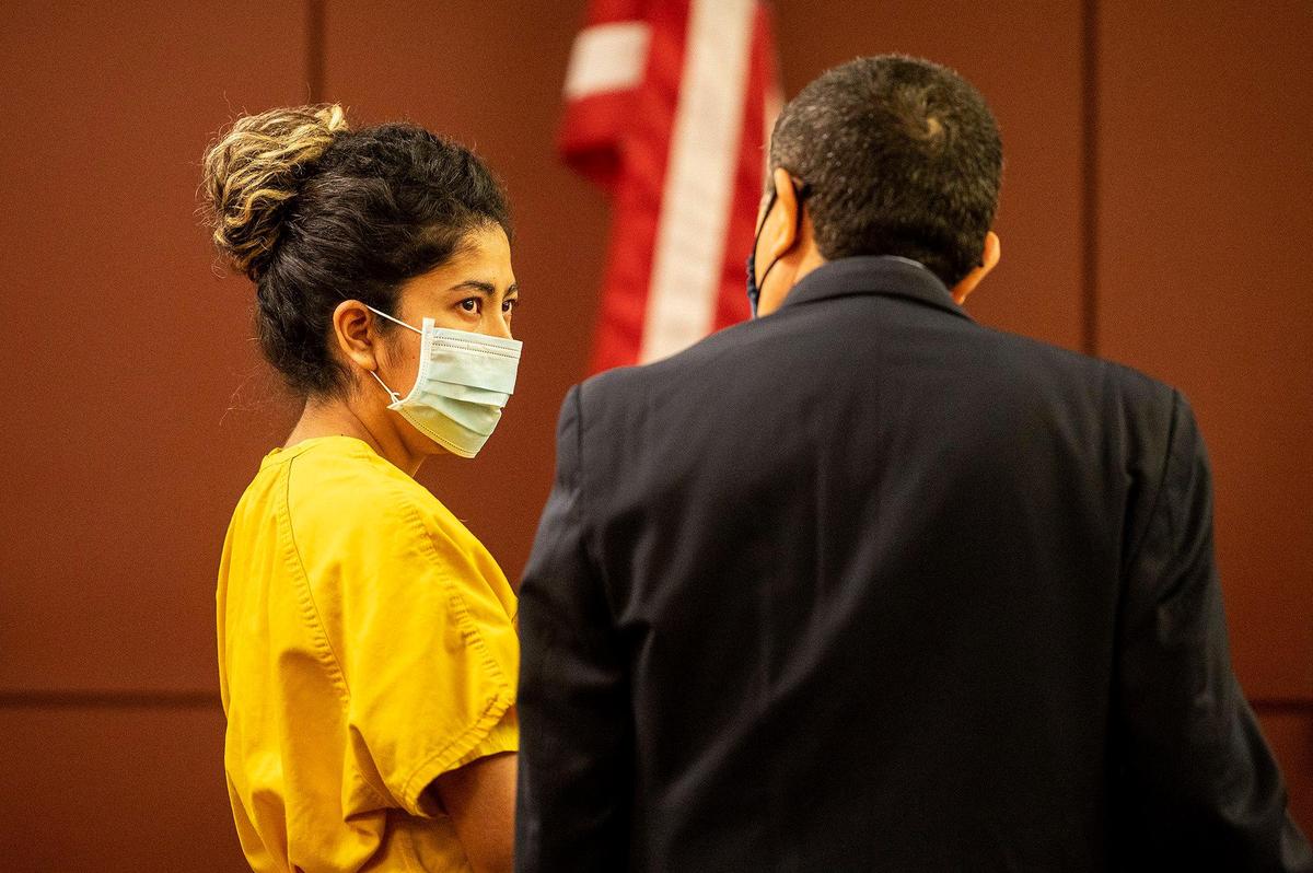 Patricia Ortiz, 30, of Le Grand, left, appears before Judge Carol Ash during an arraignment hearing at the Merced County Superior Courthouse in Merced, Calif., on Tuesday, Feb. 22, 2022. Ortiz is accused of killing her three children after their bodies were discovered in their Le Grand apartment on Jan. 12, 2022.