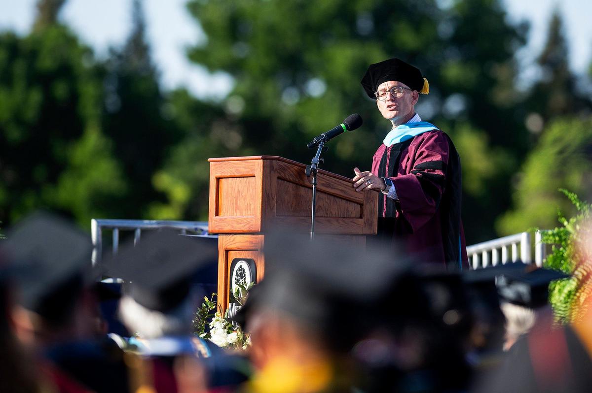 Merced College President Chris Vitelli addresses graduates during a commencement ceremony for the Merced College class of 2022 on the Don Odishoo Field at Stadium ’76 in Merced, Calif., on Friday, May 20, 2022.