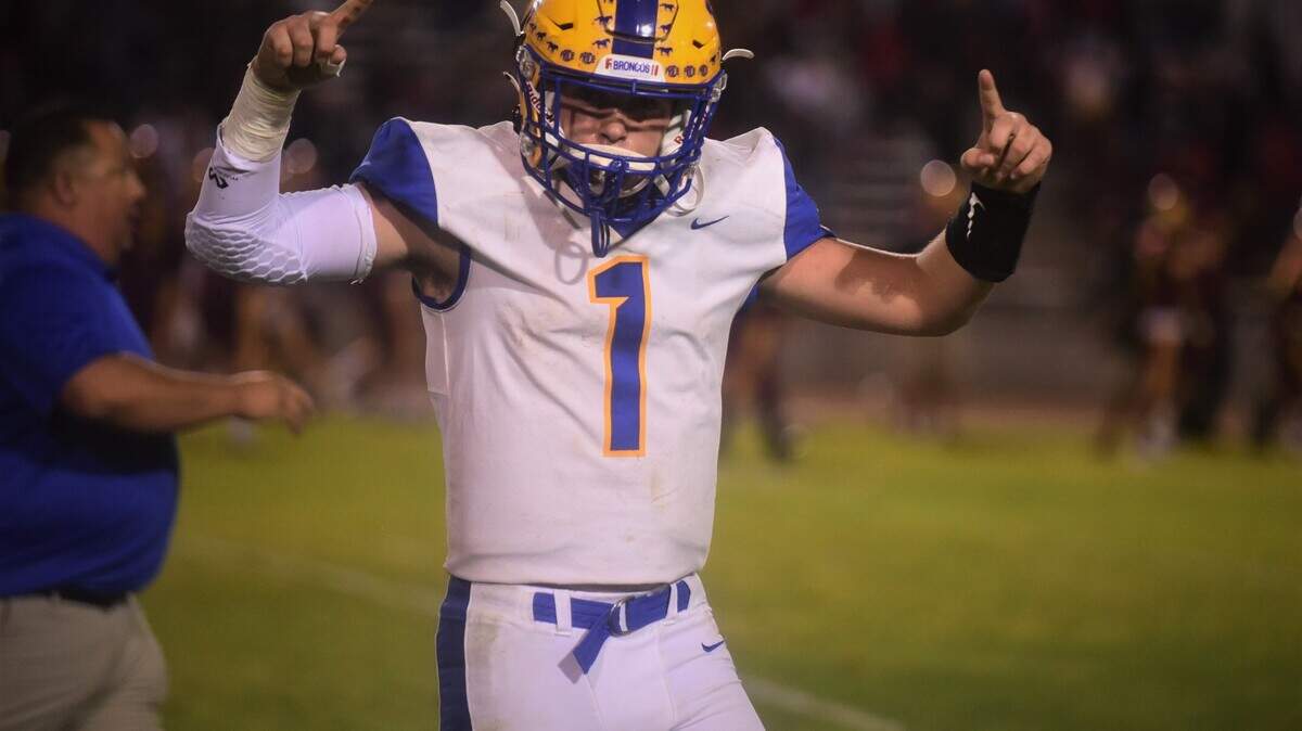 Dos Palos senor Trent Calvert celebrates after the Broncos held on to defeat Los Banos 20-13 in the Westside War on Friday, Aug. 20, 2021 at Loftin Stadium in Los Banos, Calif.