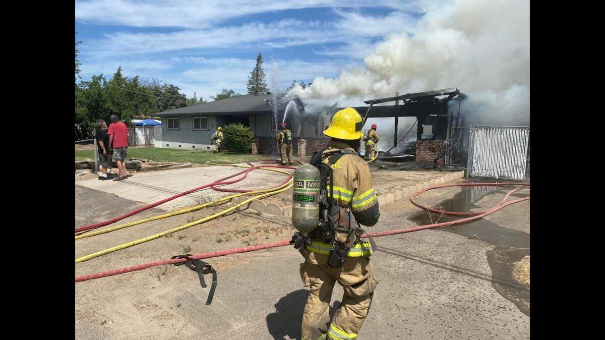 Firefighters from Merced County Fire and Atwater City Fire responded to a structure fire near Juniper Avenue and Castle Street in Atwater, Calif. on Tuesday, Aug. 2, 2022.
