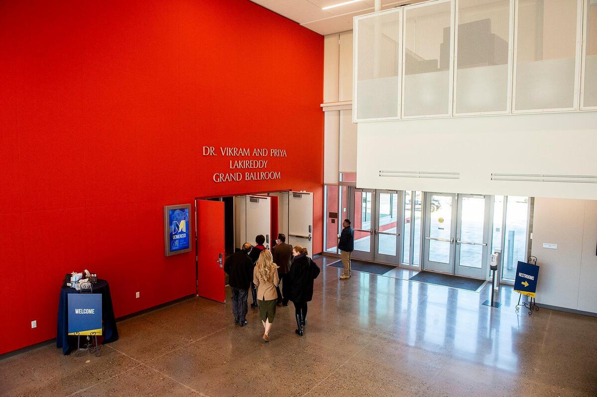 Guests enter the Dr. Vikram and Priya Lakireddy Grand Ballroom for a 20-year anniversary celebration of the groundbreaking of the University of California, Merced, in Merced, Calif., on Wednesday, Jan. 25, 2023.