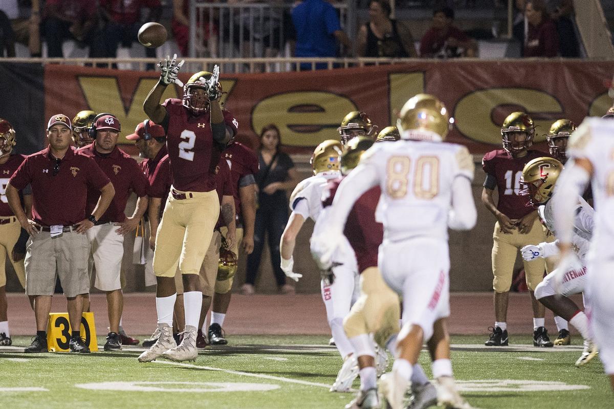 Golden Valley senior Etrell Bowers (2) catches a pass along the sideline during a game against Centennial at Veterans Stadium on the campus of Golden Valley High School in Merced, Calif., on Friday, Aug. 31, 2018. The Golden Hawks beat the Cougars 38-15.