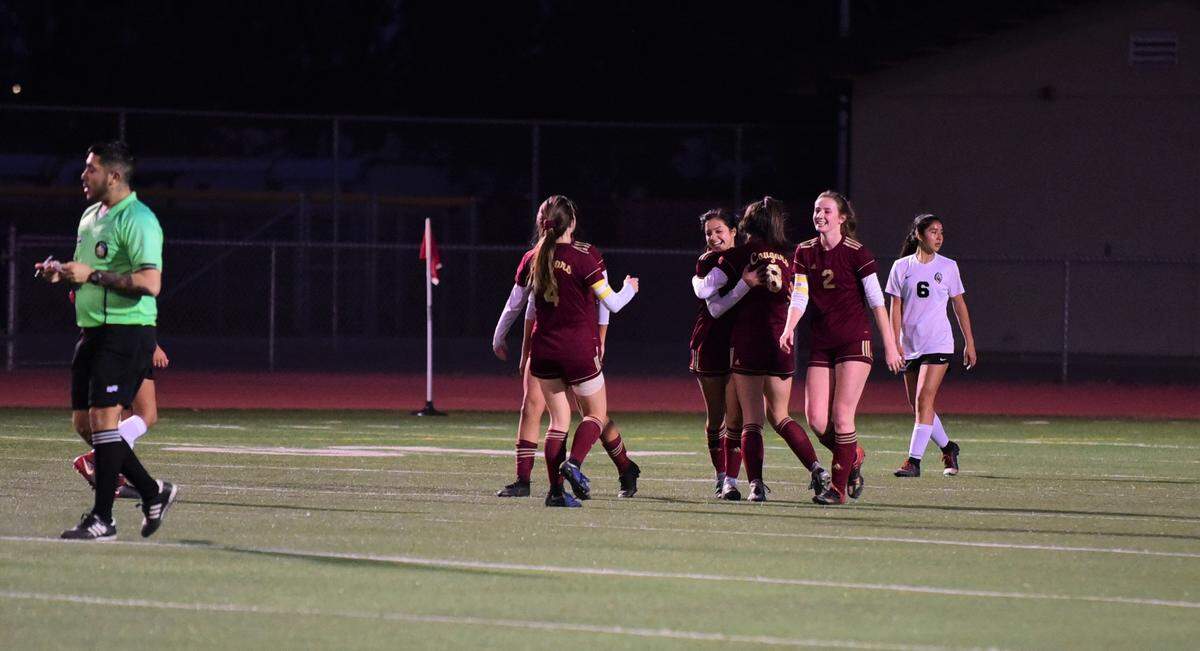 Golden Valley’s Yanell Ramirez celebrates with her teammates after scoring a goal against Merced during a game on Thursday, Feb. 13, 2020 at Veterans Stadium.