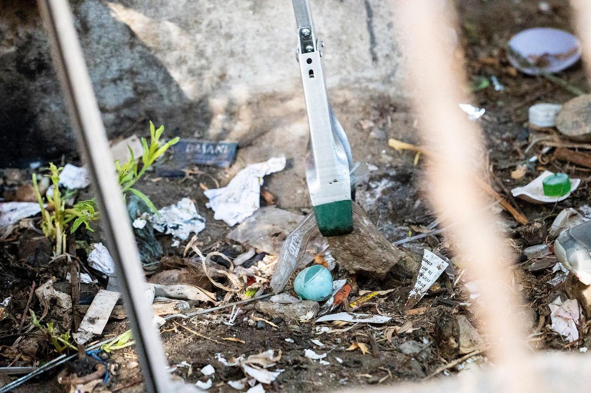 Trash is picked up from along the banks of Bear Creek beneath the McKee Road bridge during a cleanup event presented by the Merced non-profit Bear Creek Yacht Club in Merced, Calif., on Saturday, Oct. 14, 2023.
