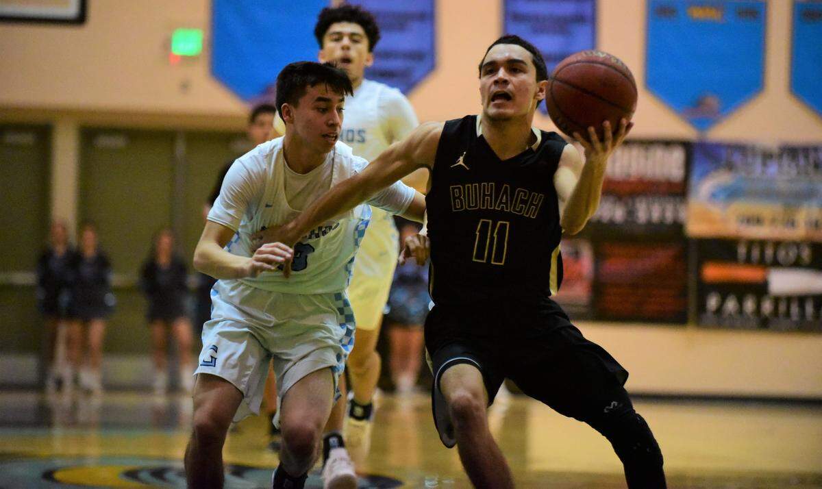 Buhach Colony senior Oscar Smallwood goes up for a shot against El Capitan on Jan. 8, 2020 at El Capitan High School.