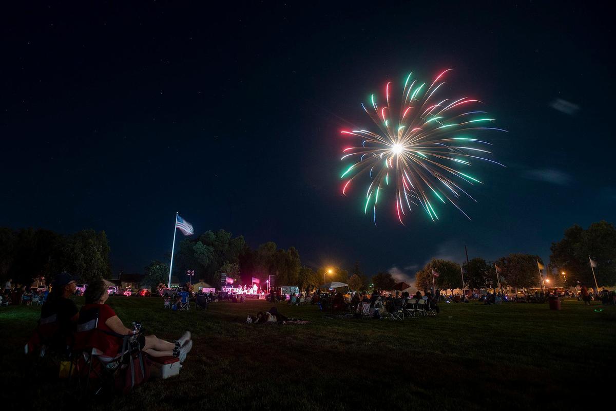 Fireworks explode in the night sky during a Fourth of July concert and fireworks show at the former Castle Air Force Base in Atwater, Calif., on Sunday, July 4, 2021.