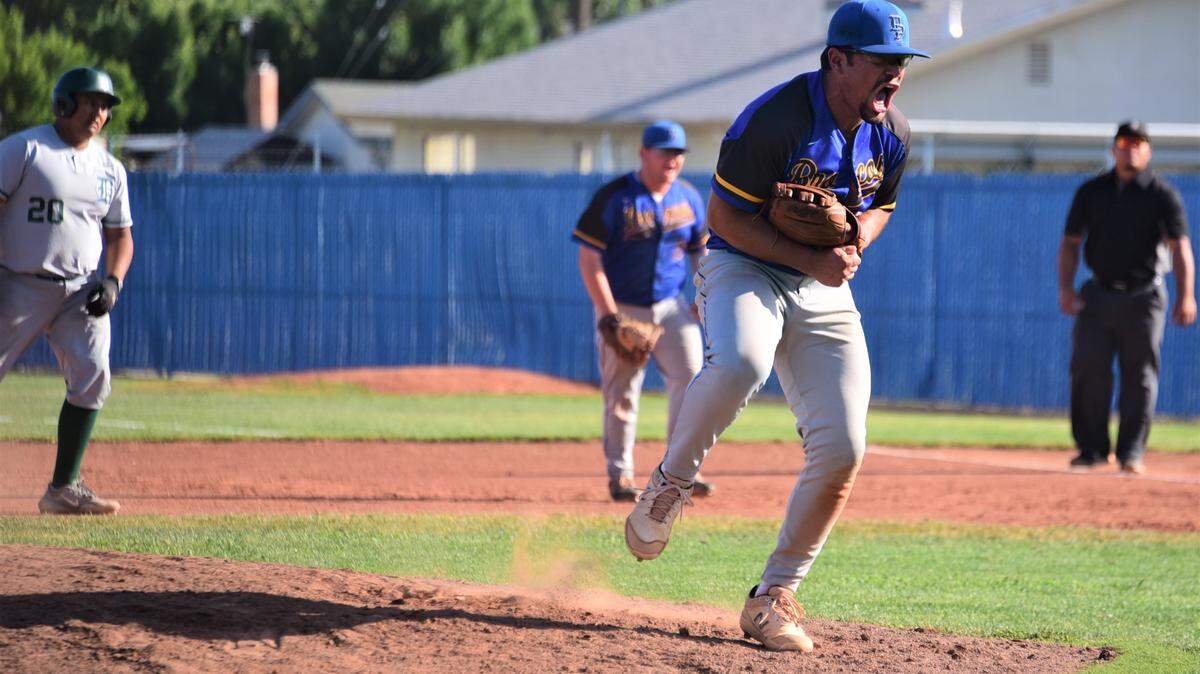 Dos Palos High School pitcher Isac Mandujano reacts after recording a strikeout to get out of a jam in the fourth inning during the Central Section Division III semifinal playoff game against Dinuba on Tuesday, May, 23, 2023 at Dos Palos High School.