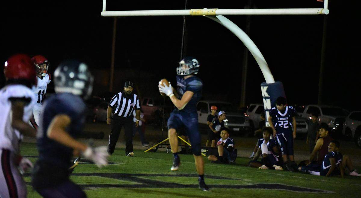 Stone Ridge Christian tigth end Max Friedman hauls in an 8-yard touchdown catch in the fourth quarter of a 21-14 loss to Woodland Christian on Saturday, Sept. 10, 2022 at Castle Field.