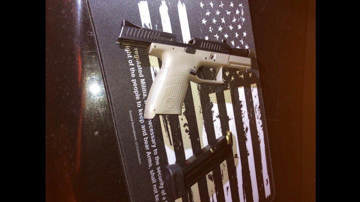 A man and woman, both with outstanding felony warrants, were arrested after a loaded gun was found during an enforcement stop on a vehicle in Merced on Tuesday, according to the Merced Police Department. Image courtesy of Merced Police Department.