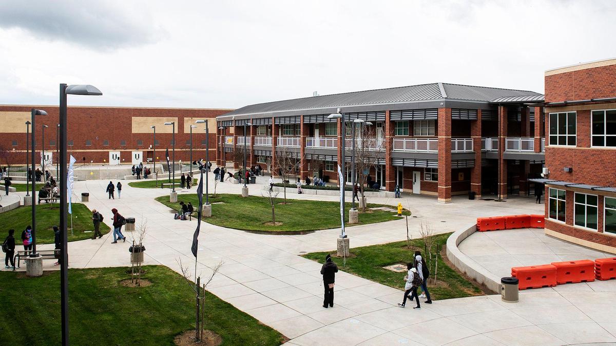Students walk the campus of El Capitan High School in Merced, Calif., on Monday, March 15, 2021.