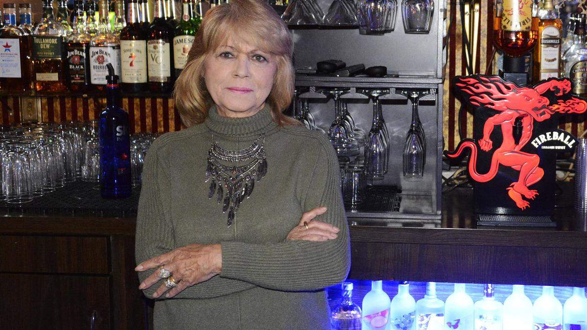 Lucy Penrod, 72, owner of Lucy’s Studio Lounge, poses for a portrait behind the bar in Atwater, Calif., on Wednesday, March 6, 2019.